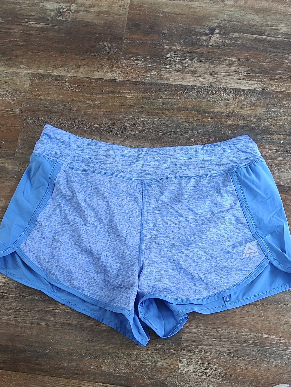 Reebok Women’s Heathered Light Blue Athletic Shorts
